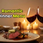 Romantic Valentine's Day dinner table setting with steak and wine.